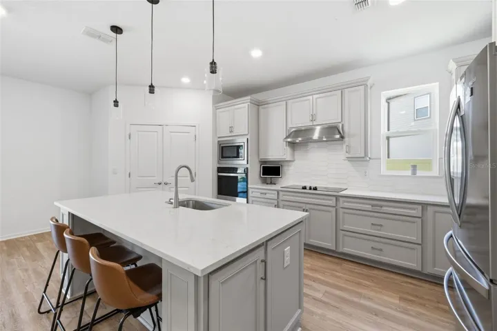 Welcoming breakfast bar and closet pantry