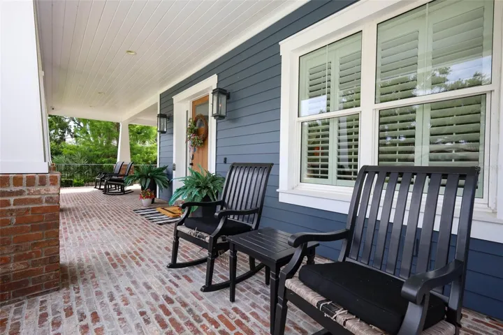 42 X 19 Solid Brick porch with wrought iron railing,