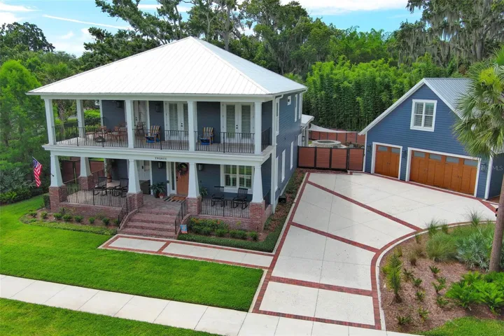 Architectural finished driveway with brick inlays.