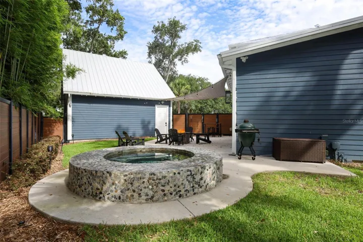 Inground spa with tile finishes, automated gas heating and pump system with WIFI access control.