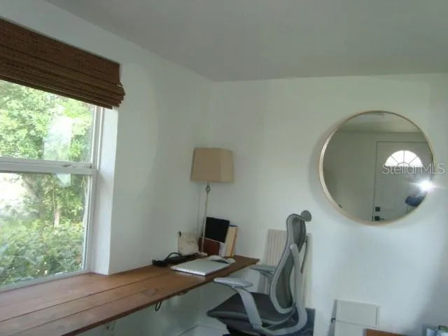 Walk in area with desk