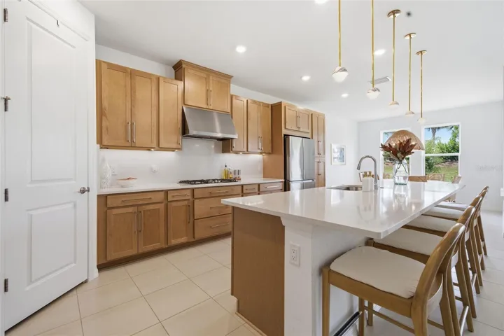Kitchen with island and walk in pantry