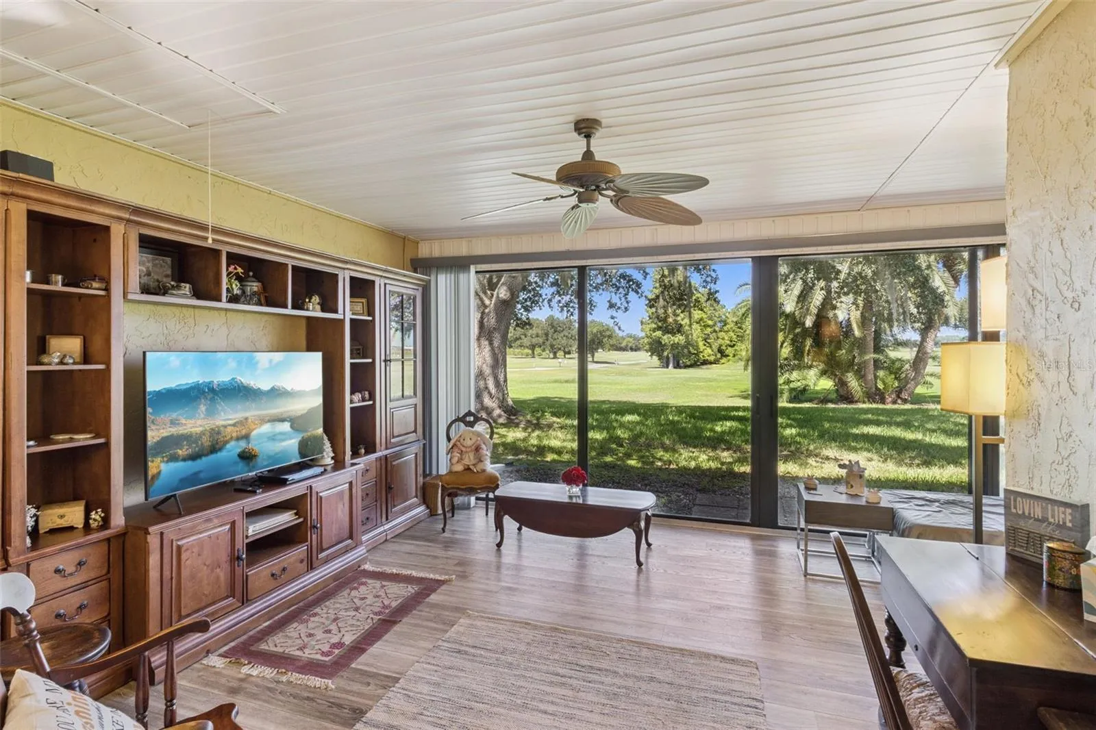 Large Florida Room with Oversized Glass Sliding Doors