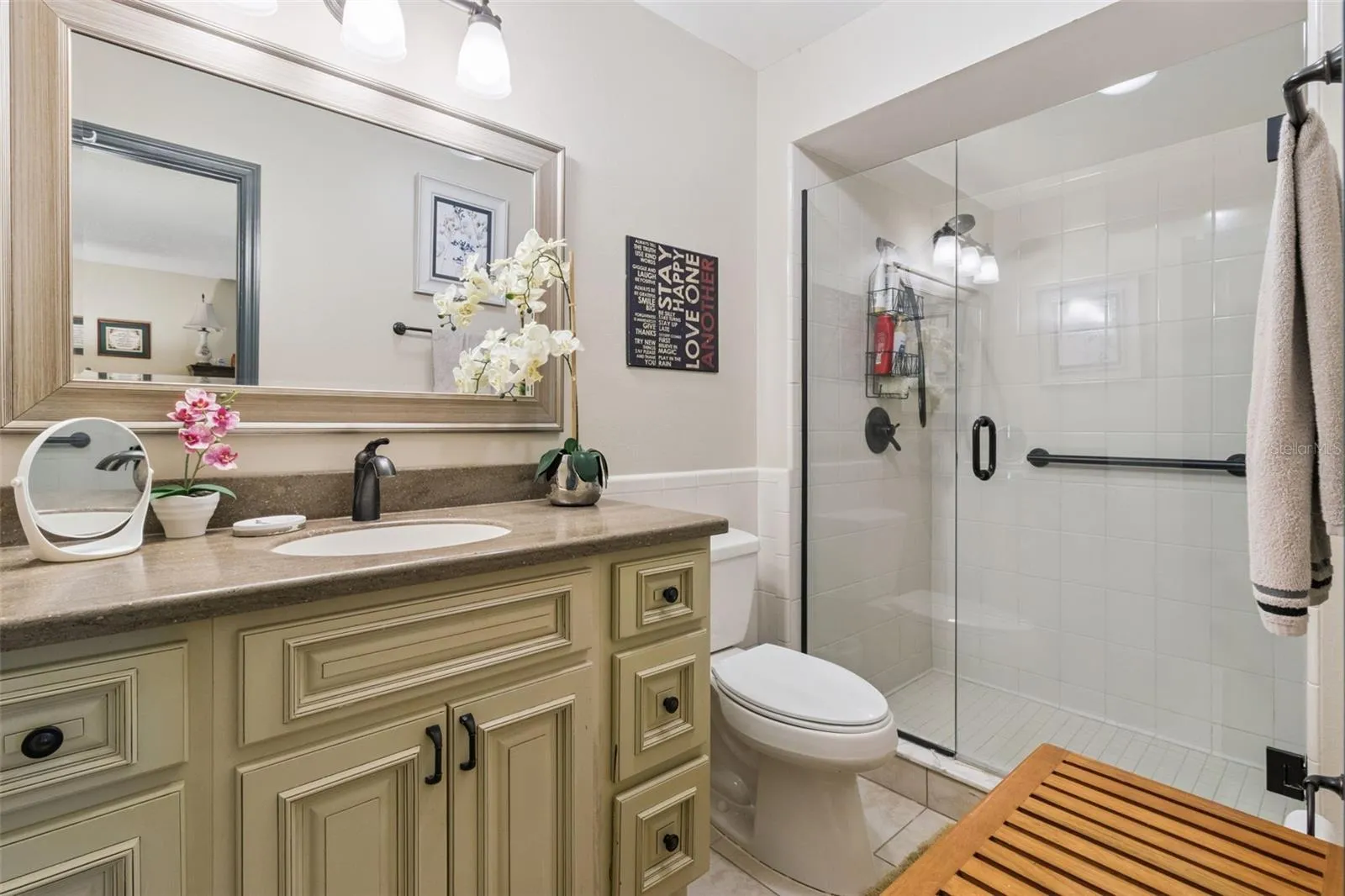 Primary Bathroom features Walk-in Shower with frameless glass enclosure