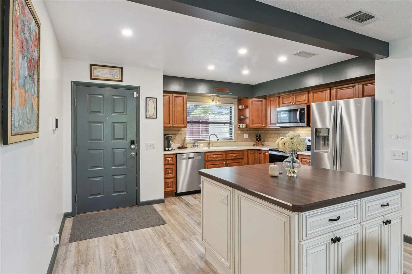 Vinyl Plank flooring is featured throughout the main living areas