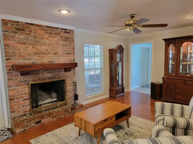 Cozy sitting room with fireplace off the kitchen