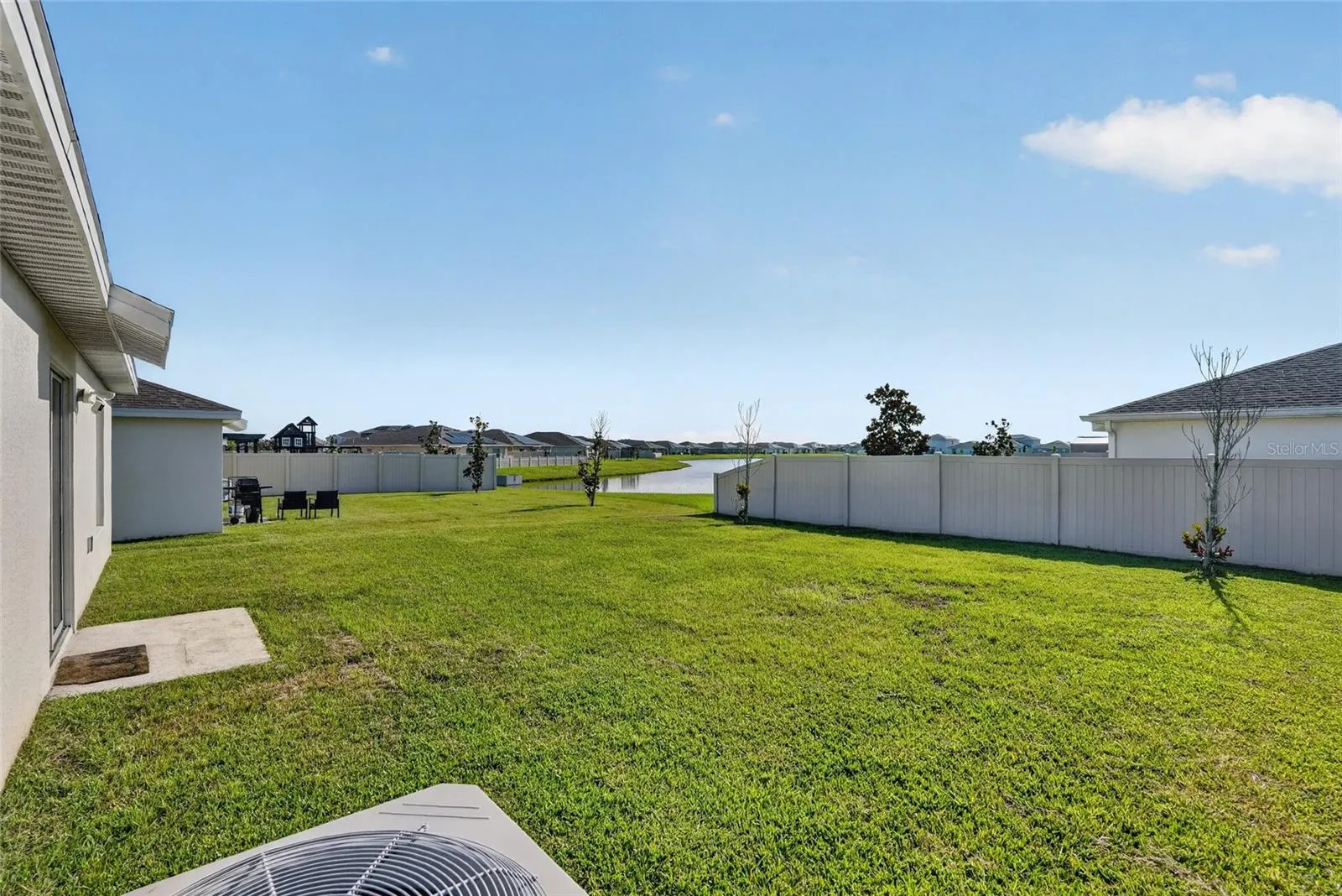 Backyard with Partial Pond View