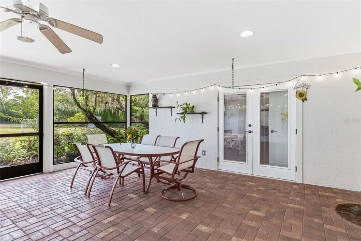 Main House Screened Lanai with Outdoor Seating