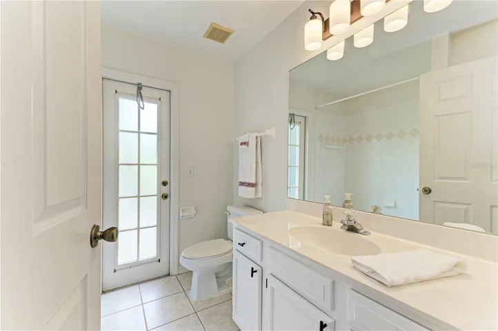 Bathroom 2 with vanity, linen closet and tub/shower combo