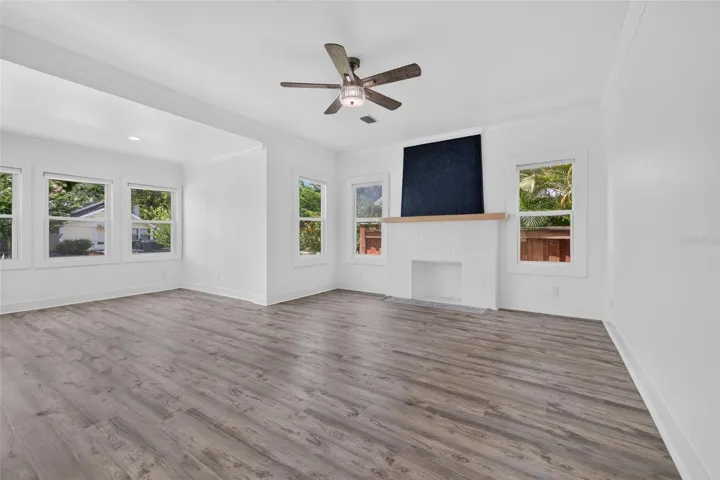 Muted Multi-Tonal Luxury Vinyl Plank Flooring Throughout