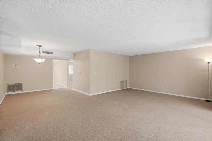 LIVING ROOM/DINING/GUEST BEDROOM IN VIEW