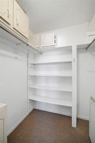 PRIMARY WALK-IN CLOSET