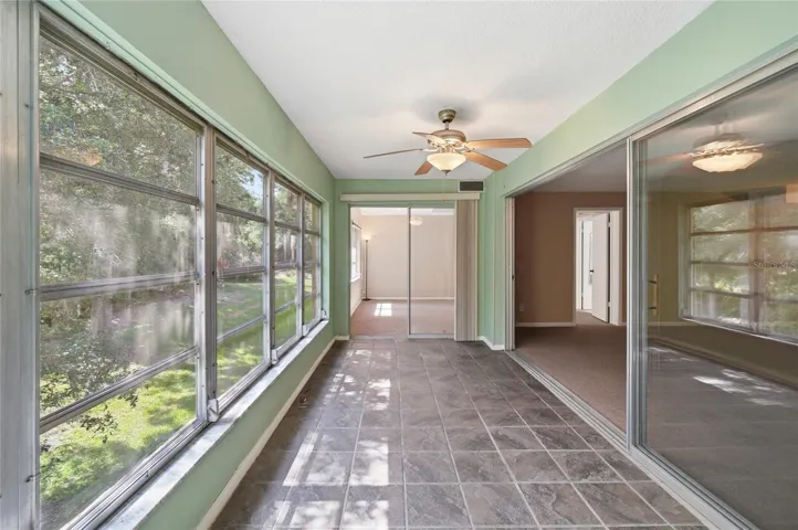 SUNROOM/PRIMARY BEDROOM/LIVING ROOM