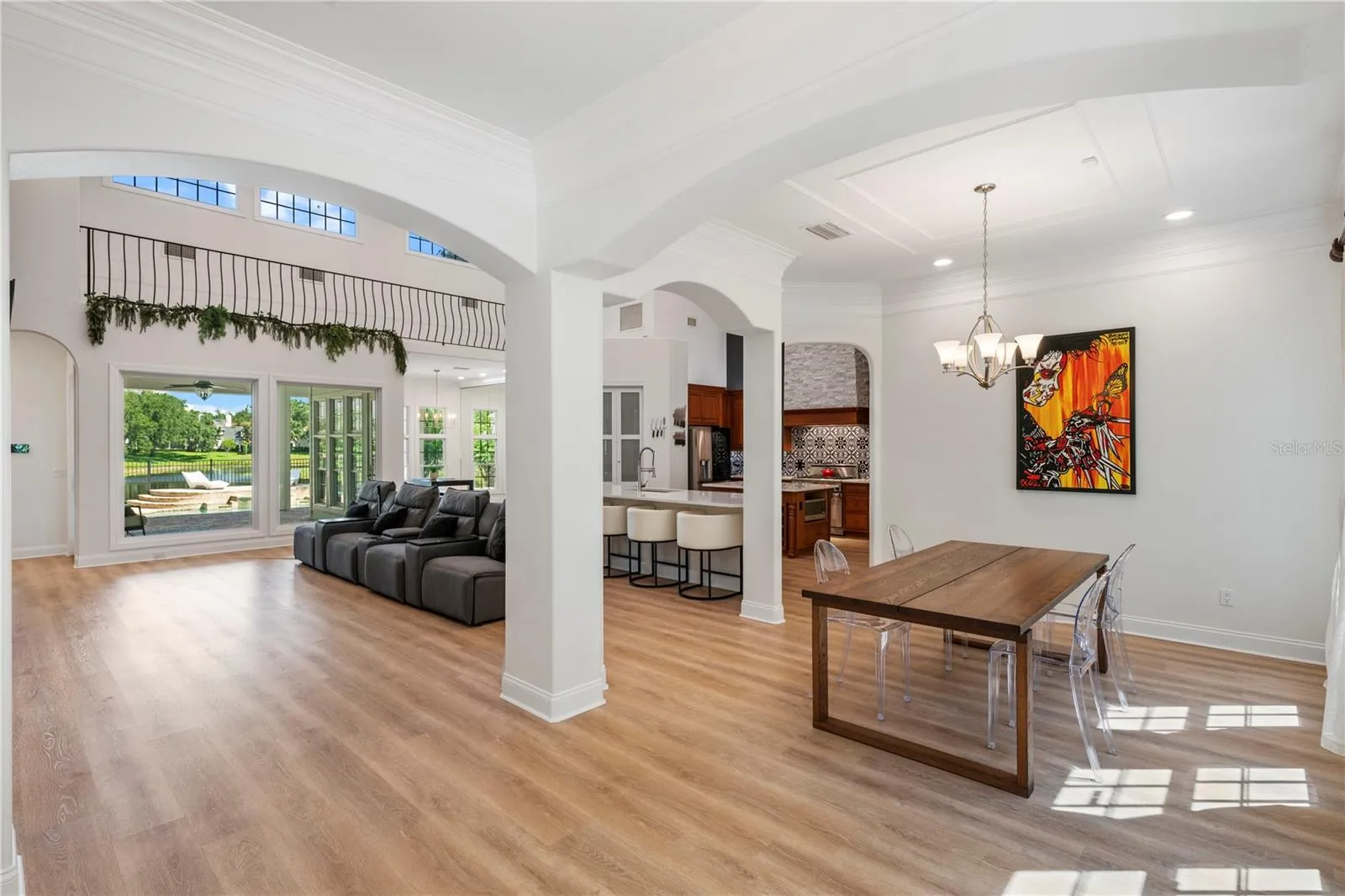 View from foyer into Great Room and kitchen to rear right