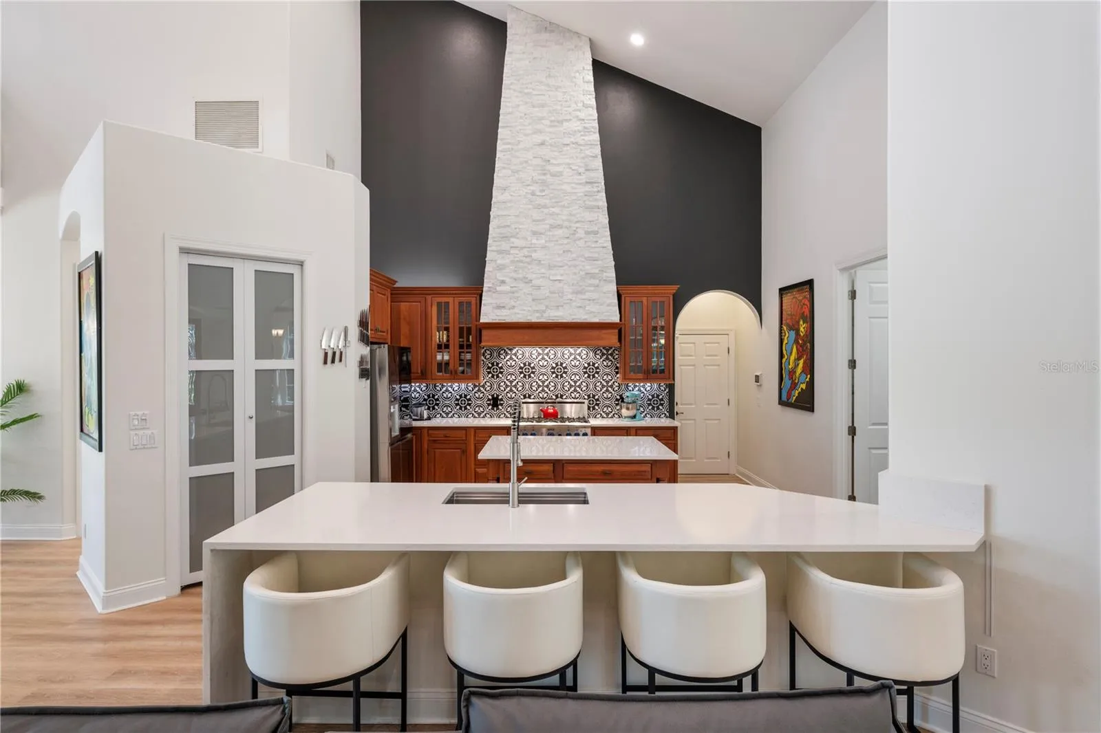 Awesome gathering space with sleek panty doors
