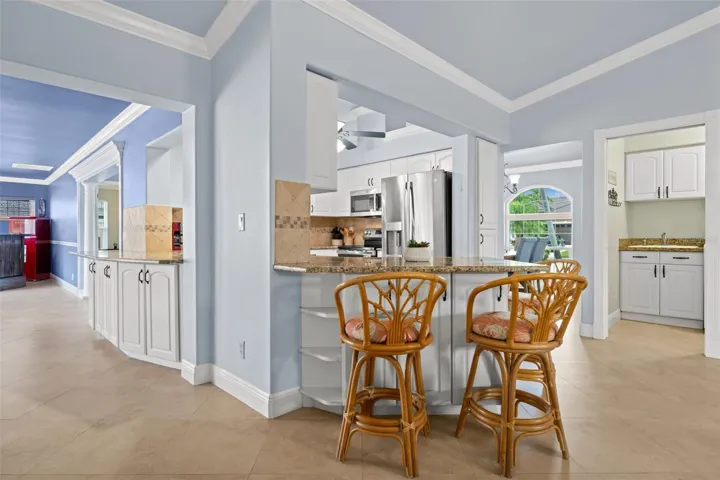 Breakfast bar and serving window in the kitchen