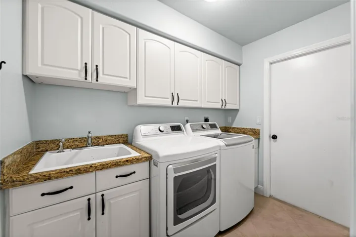 Laundry room with sink