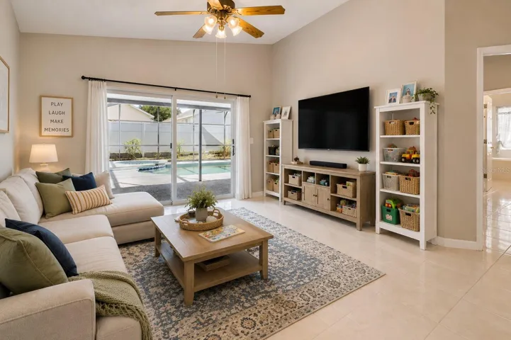 Staged Living Room w/ Access to Backyard/Pool/Lanai