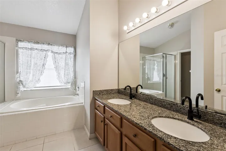 Master Bathroom w/ Double Vanity Sink and Soaking Tub