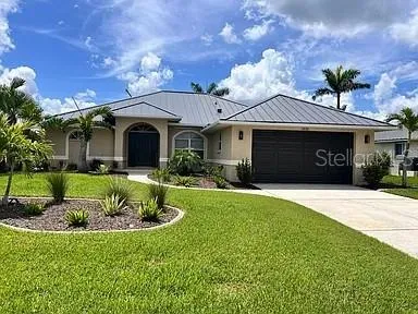 Welcome to your new home located in prestigious Punta Gorda Isles