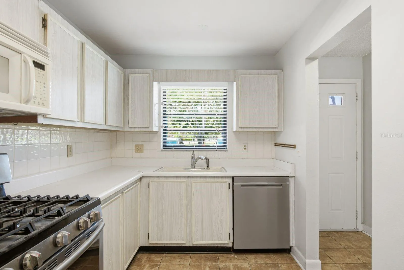 Kitchen overlooks parking