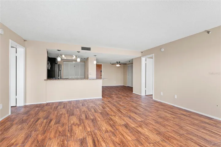Open and spacious living. Looking into the dining and kitchen.... makes entertaining a breeze.