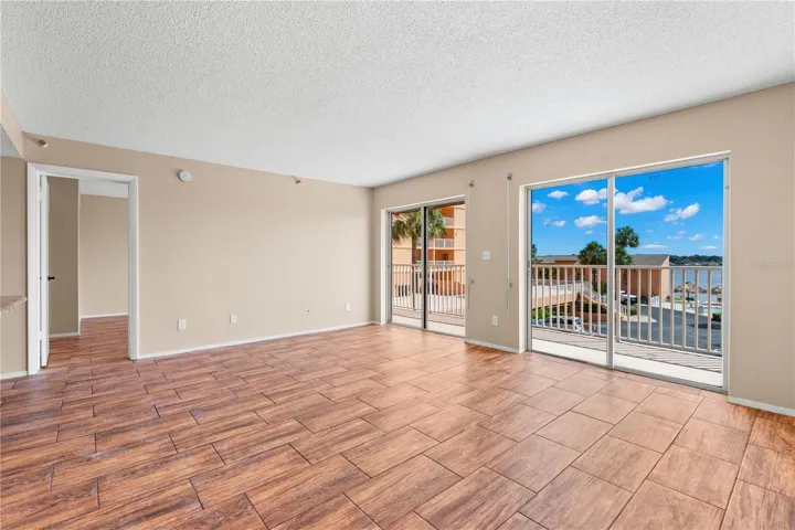 Living Room - 2 sets of sliding glass doors with expansive views.