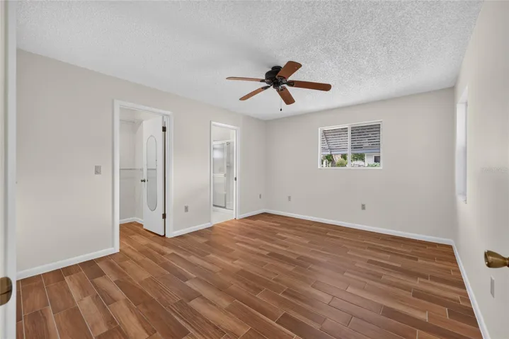 Primary Bedroom with Tile Flooring