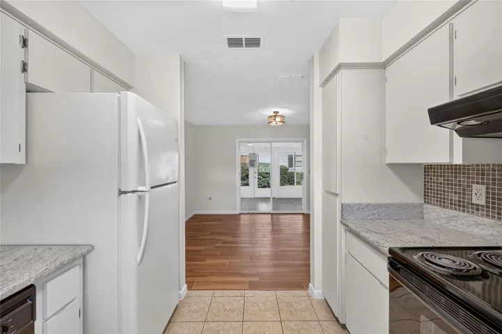Pantry Cabinets to the left of the Range