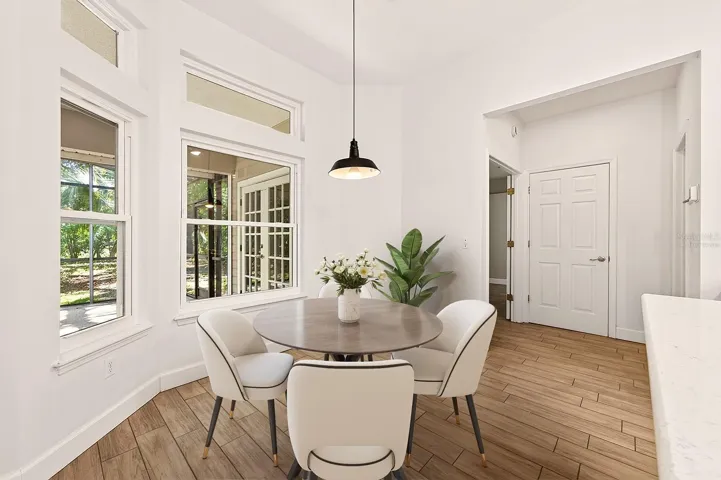 Light filled breakfast nook overlooks the lanai. Virtually Staged.