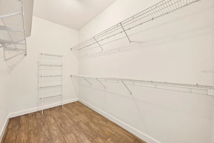 Primary suite walk-in closet.