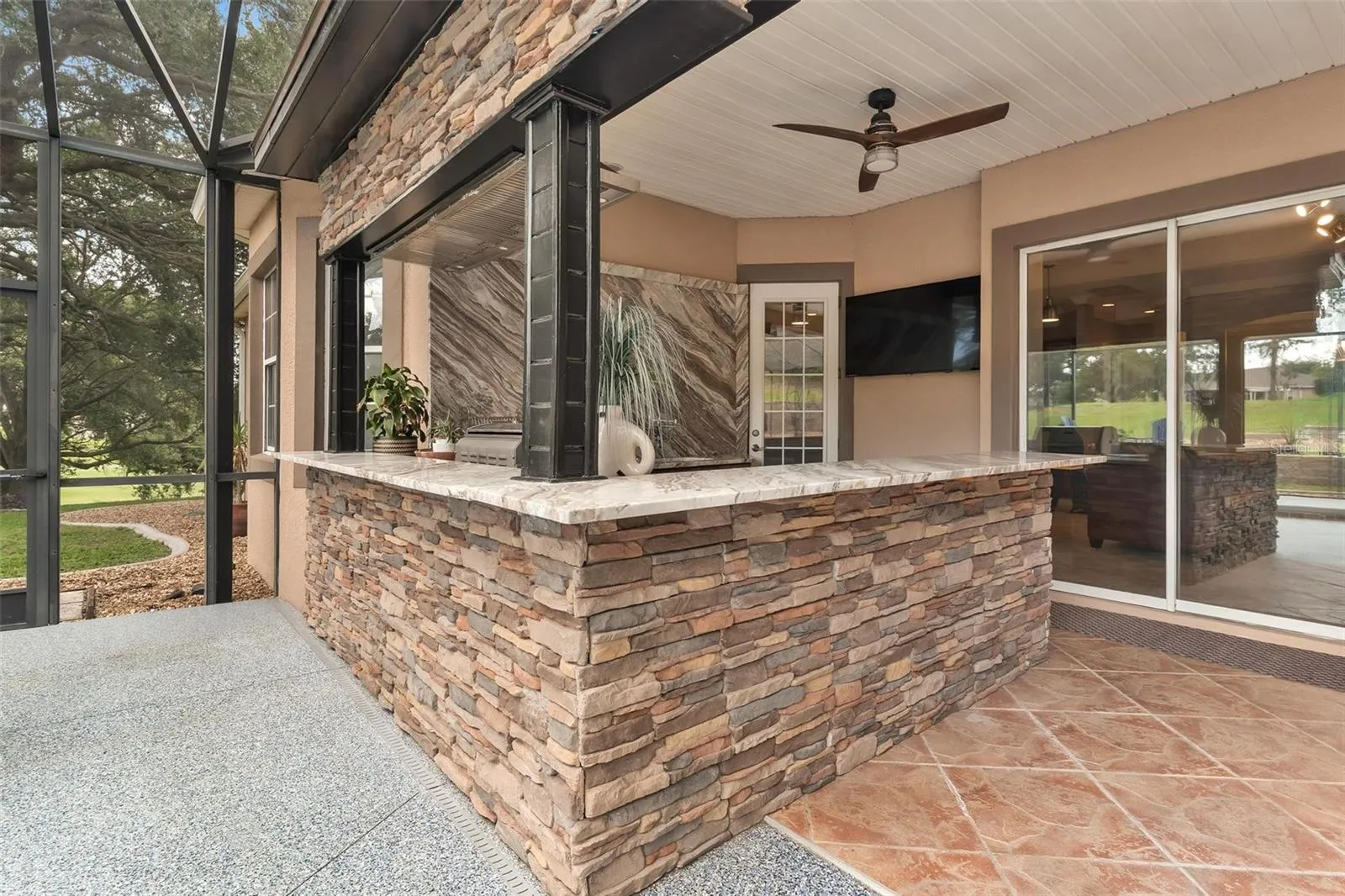 Glass Sliders to Living Room from Pool Area