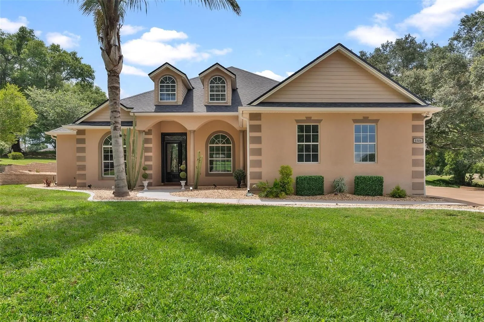 Welcoming Exterior Entry with Glass Door...