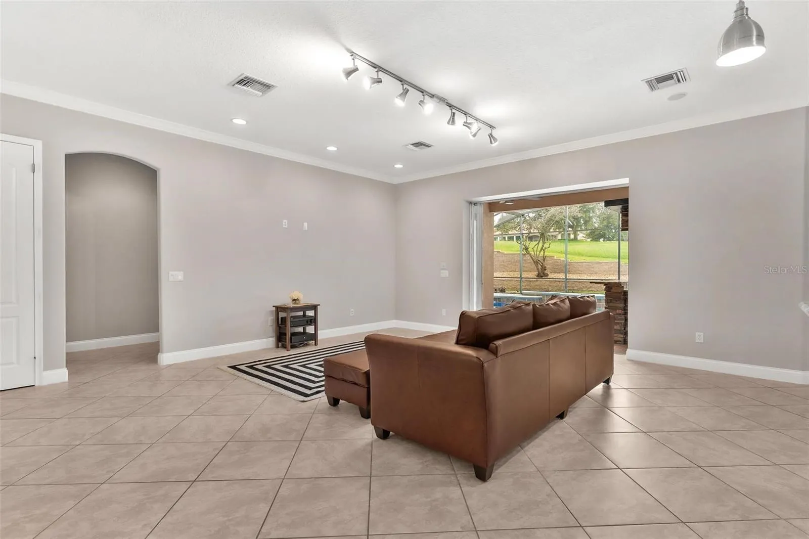 Living Area with Sliders to the Pool Area