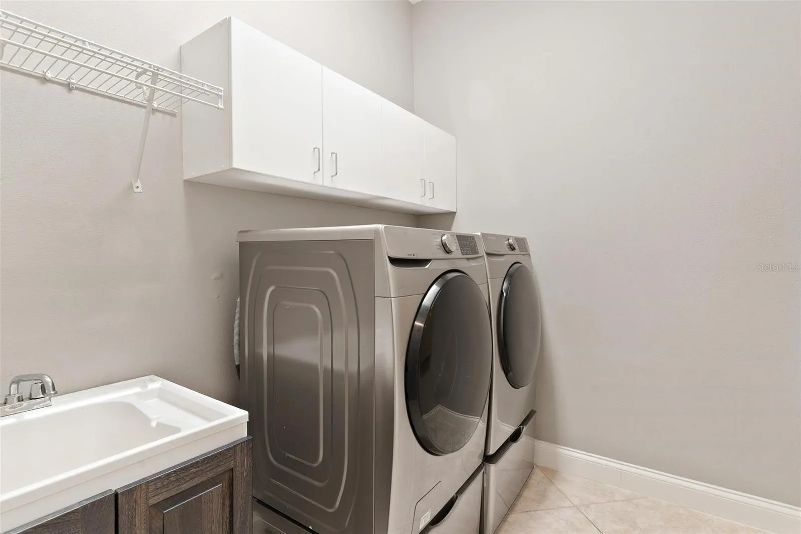 Indoor Laundry Room with Sink