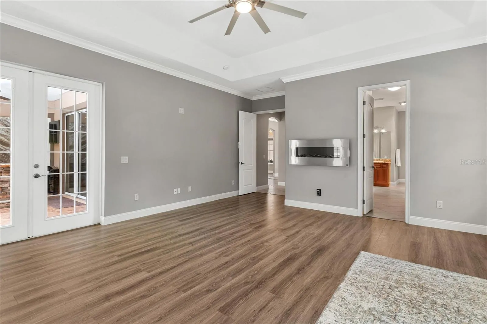 Primary Bedroom with electric fireplace