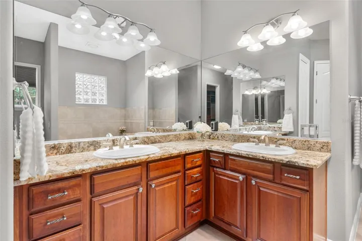 Dual Vanities with Granite Countertops