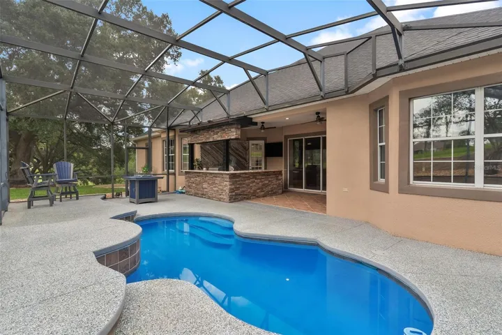 Enjoy a refreshing dip in the sparkling pool on warm Florida days.