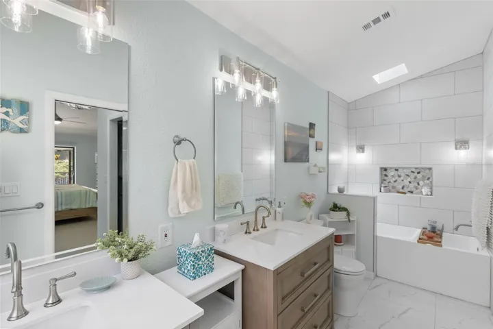 Shower, Soaking Tub, Double Vanities