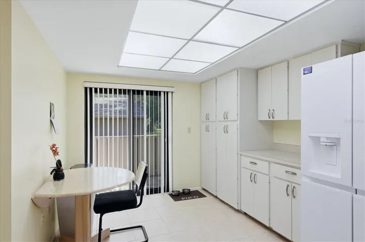 Eat in kitchen with plenty of cabinetry/pantry