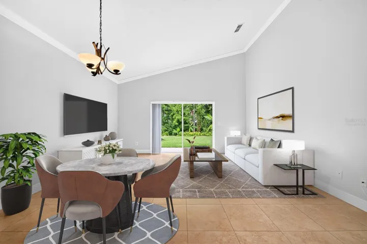 Casual dining off the kitchen open to the family room complete with wooded views. Virtually Staged.