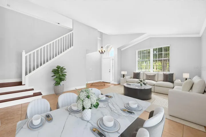 Formal living and dining spaces are great for entertaining. Virtually Staged.
