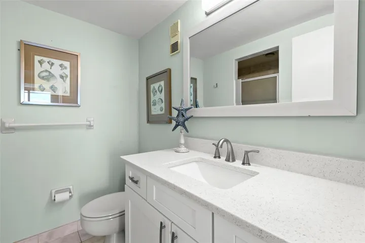 Bedroom 2 ensuite bath with walk in shower.