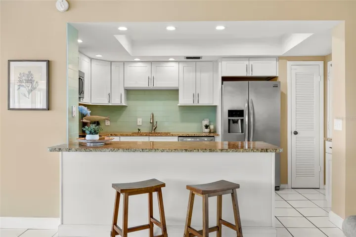 Open kitchen with spacious granite counters