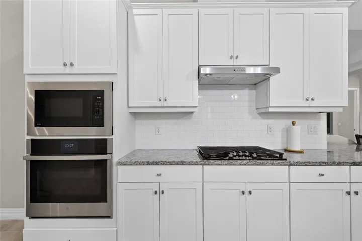 Kitchen Microwave, oven, gas stove, hood
