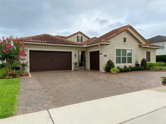 Front view exterior with circular driveway
