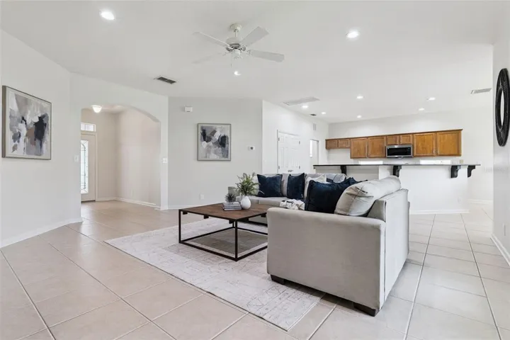 View of the Great Room, Kitchen & Foyer entryway