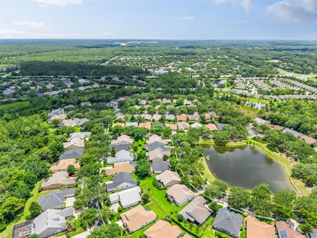 Aerial view of the surrounding neighborhood by the home