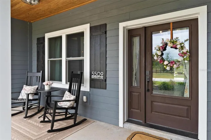 Cozy Front Porch greets you as you enter the home.