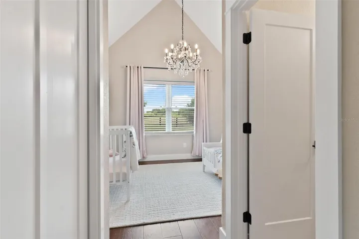 Bedroom #3 features Old English flooring, private bath.